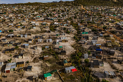 Buy stock photo Rural, township and poverty with shacks, houses or informal settlement of land or squatter camps in South Africa. Aerial view of village, housing or poor infrastructure of town or developing country