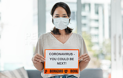 Buy stock photo Shot of a woman holding up a sign saying 