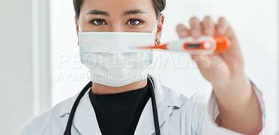 Buy stock photo Cropped shot of a medical practitioner holding up a thermometer
