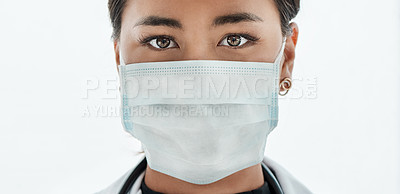 Buy stock photo Portrait of a young doctor wearing a face mask