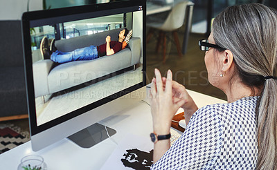 Buy stock photo Shot of a young man having a counselling session with a psychologist using a video conferencing tool