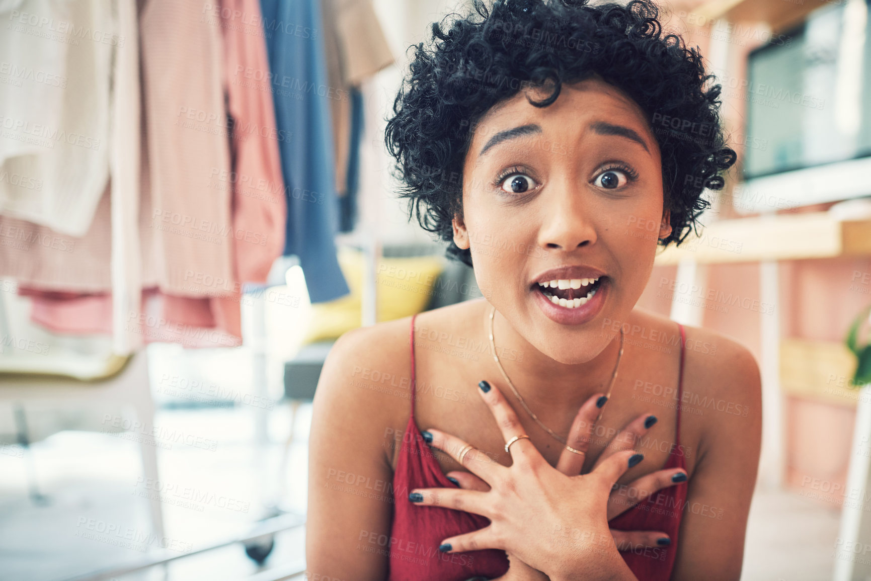 Buy stock photo Cropped shot of a beautiful young woman looking at the camera