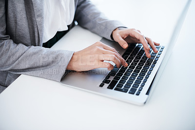 Buy stock photo Shot of a businesswoman using a computer in a modern office