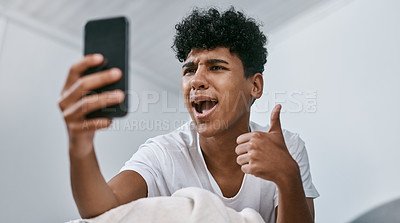 Buy stock photo Excited, man and thumbs up for selfie, success or post photo on social media to relax in home bedroom. Picture, smile and like hand gesture with African person, influencer laugh or emoji for winning