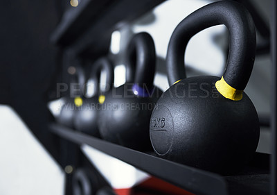 Buy stock photo Still life shot of kettlebells in a gym
