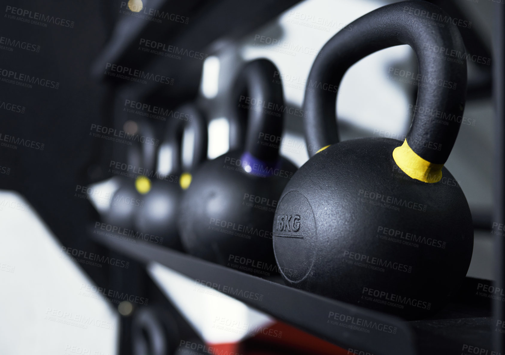 Buy stock photo Still life shot of kettlebells in a gym