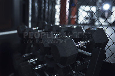 Buy stock photo Still life shot of dumbbells in a gym