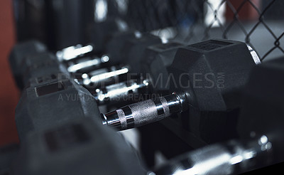 Buy stock photo Still life shot of dumbbells in a gym