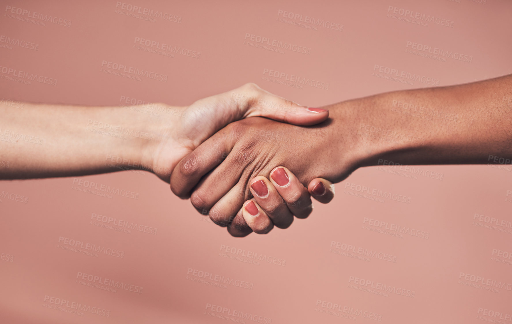 Buy stock photo Shot of two unrecognizable women shaking hands