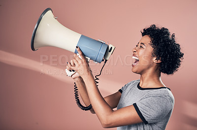 Buy stock photo Studio, protest and woman with megaphone for voice, leadership or communication for message. Courage, female person or activist with vocal for opinion, speaker or freedom of speech by pink background