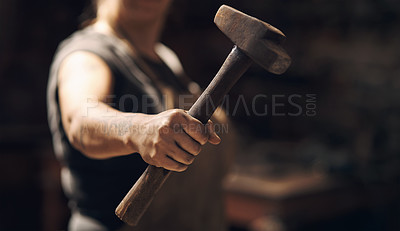 Buy stock photo Woman, hand and holding hammer with small business for crafting metal and object at workshop. Female person, blacksmith and empowerment or affirmative action for welder work, welding and industrial