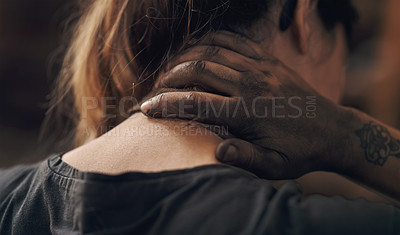 Buy stock photo Shot of a young woman experiencing neck pain while working at a foundry
