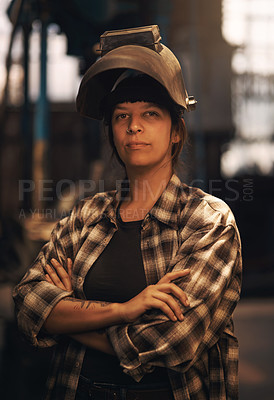 Buy stock photo Portrait of a confident young woman working at a foundry