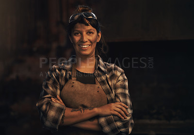 Buy stock photo Woman blacksmith, portrait and smile in workshop, industrial warehouse or trade with entrepreneurship. Small business owner, female entrepreneur or confident in factory, industry or metalwork artisan