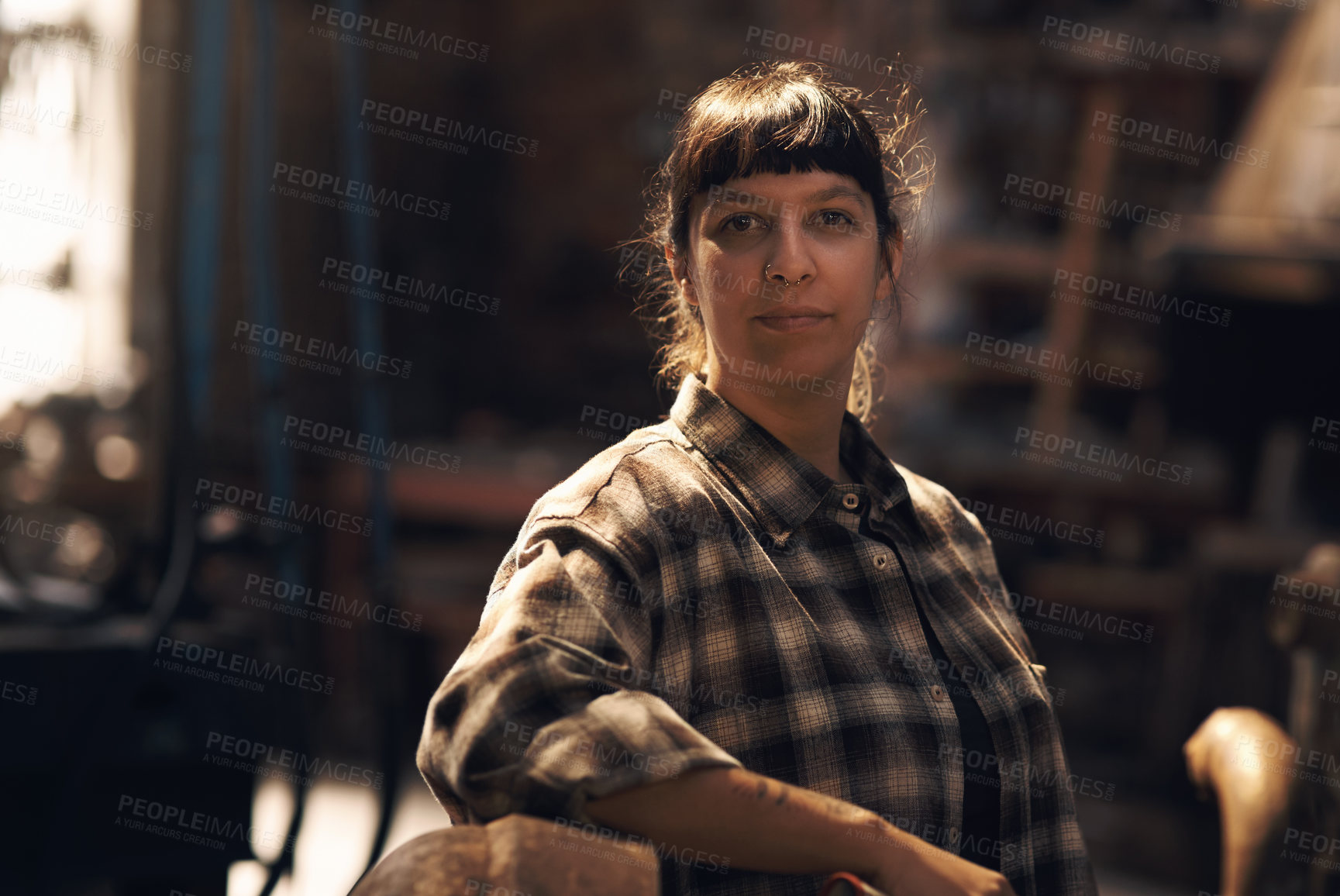 Buy stock photo Woman blacksmith, portrait and workshop for industry, trade or artisan job for entrepreneurship. Small business owner, female entrepreneur or confident in factory, industrial warehouse or metalwork