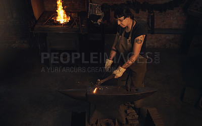 Buy stock photo Blacksmith, steel and hammer in workshop for craft, skill and artisanal creativity. Woman, manufacturing and hot iron in foundry for production, forging and shaping with safety gear in metal industry