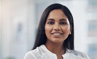 Buy stock photo Portrait of a confident young businesswoman in an office