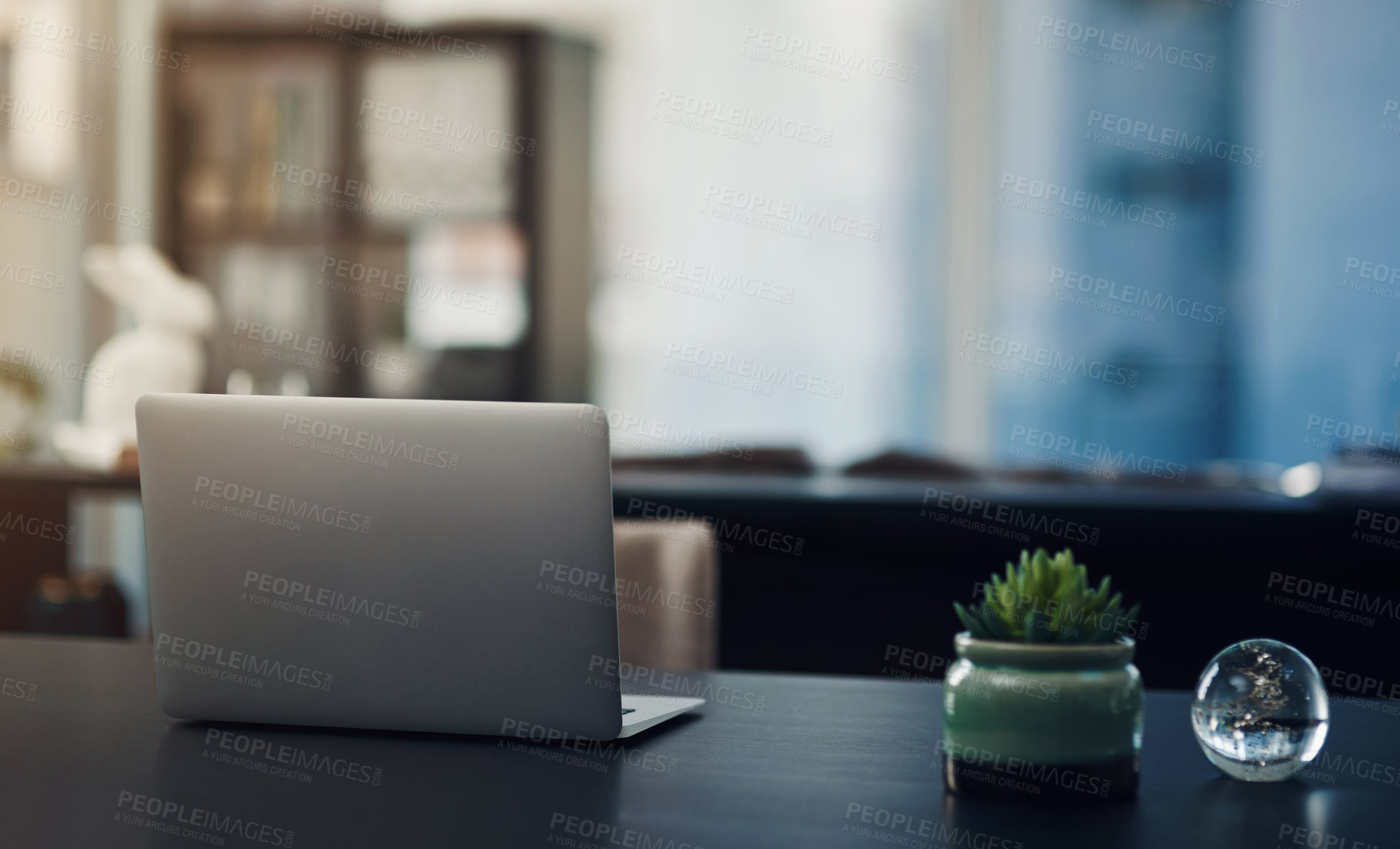 Buy stock photo Still life shot of a laptop on a table in an office