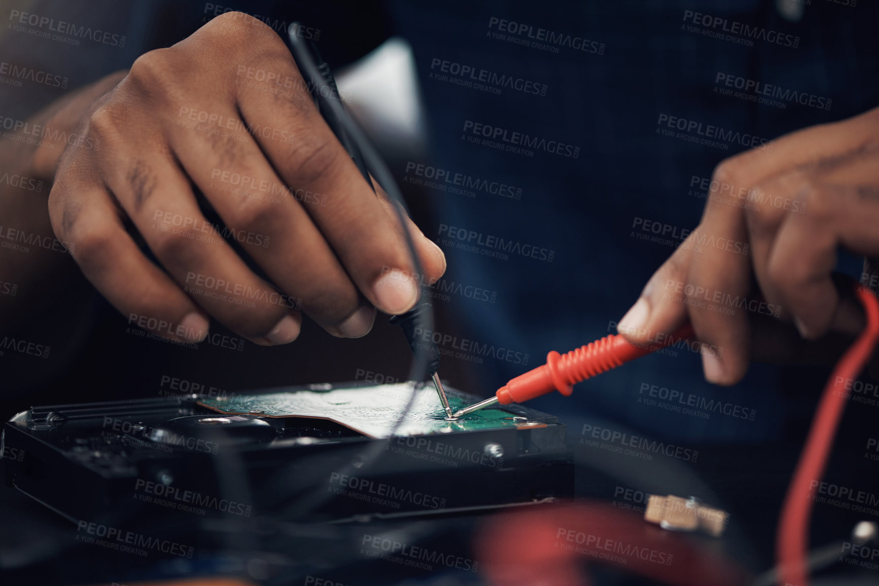 Buy stock photo Shot of an unrecognisable technician repairing computer hardware
