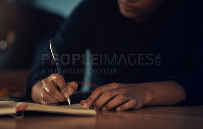 Buy stock photo Shot of an unrecognisable technician writing in a notebook while repairing computer hardware