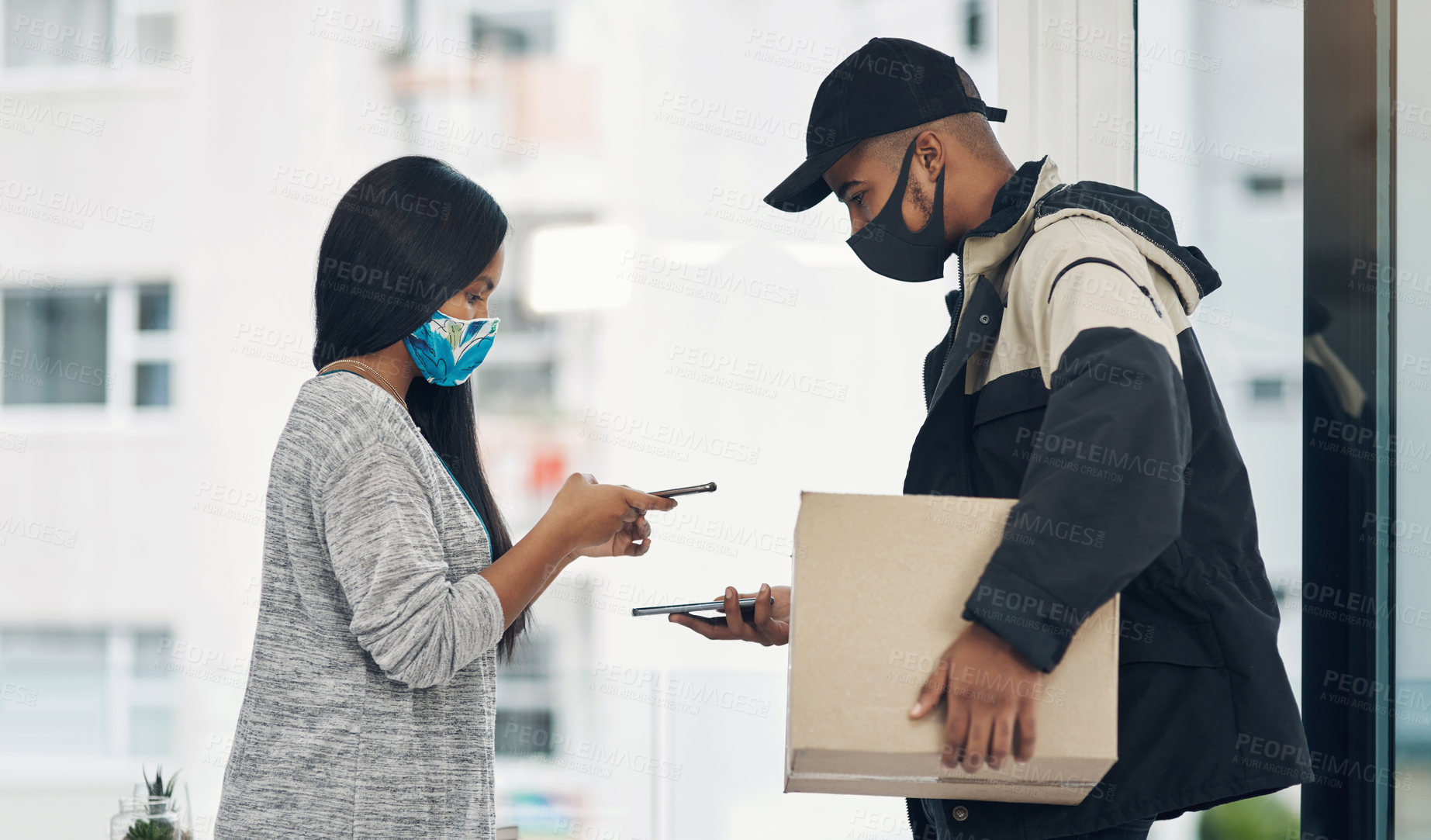 Buy stock photo Woman, delivery man and face mask with phone of courier service, mobile payment and distribution compliance. People, package and online shopping of digital transaction, commerce safety and front door