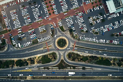 Buy stock photo High angle shot of a large parking lot in an urban city