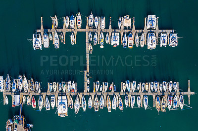 Buy stock photo Ocean, harbor and drone of boats on the water for travel, sailing and holiday in Spain. Environment, marine and above of sea transportation at a port for vacation, cruise and traveling adventure