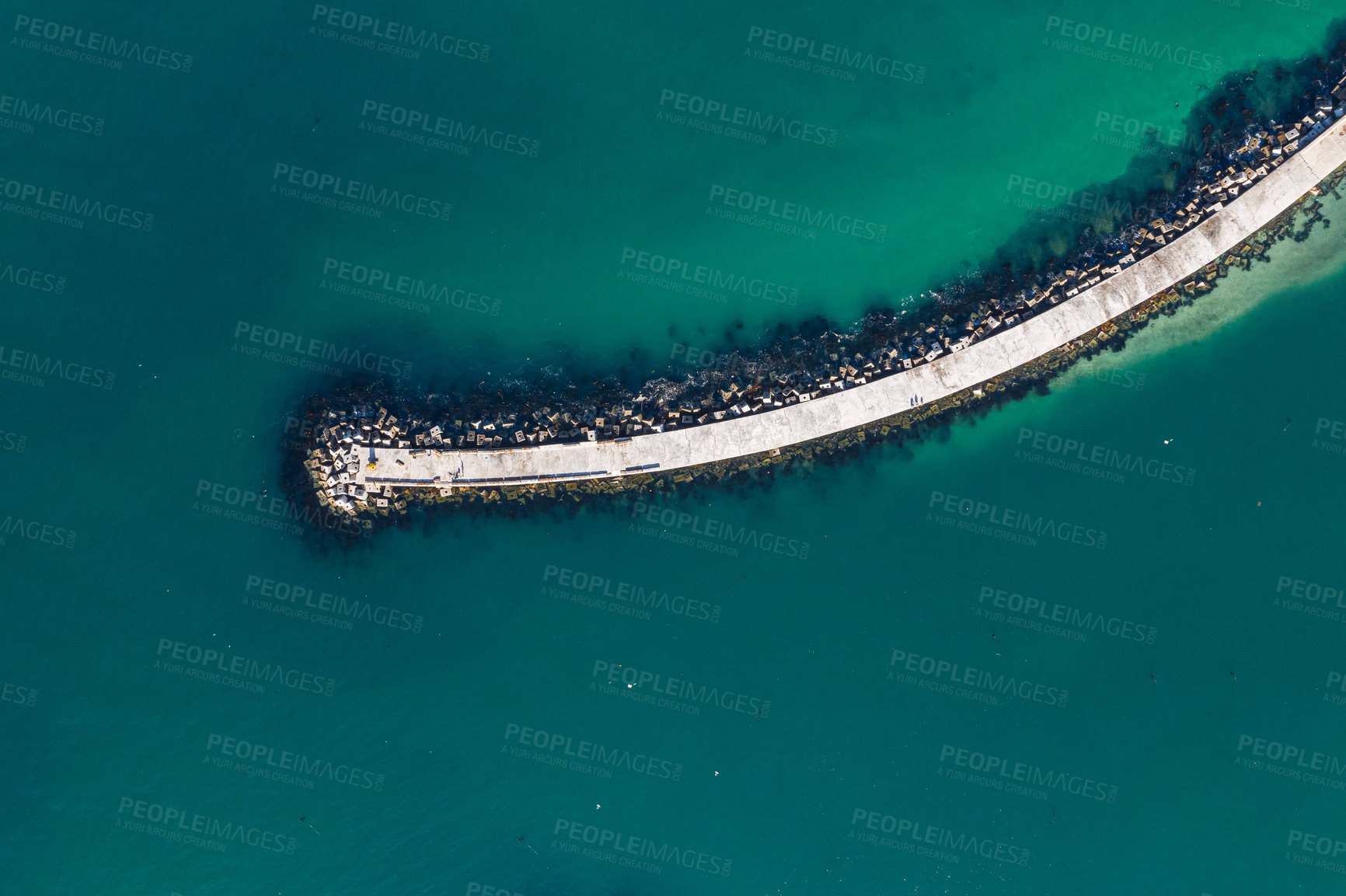 Buy stock photo High angle shot of a pier at sea