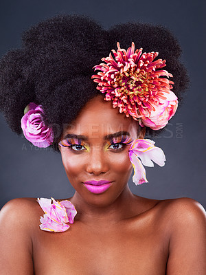 Buy stock photo Art, flowers and portrait of black woman in studio for beauty, creative and spring. Natural, cosmetics and floral with african model isolated on dark background for makeup, self love or confidence