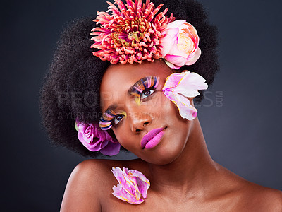 Buy stock photo Makeup, flowers and face of black woman in studio for beauty, creative and spring. Natural, cosmetics and floral with african model isolated on background for art, self love or confidence