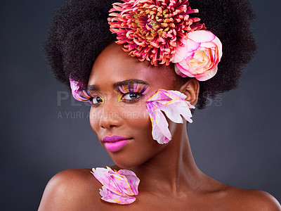 Buy stock photo Flowers, portrait and salon with afro black woman in studio on dark background for natural cosmetics. Face, beauty or skincare and young model with protea in hair for aesthetic wellness at spa