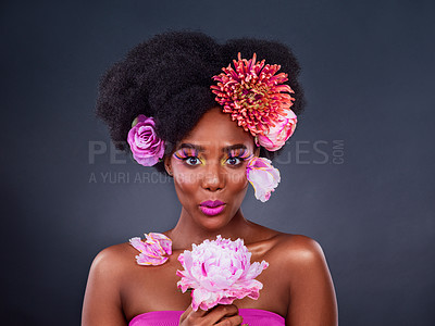 Buy stock photo Beauty, flowers and hair with portrait of black woman in studio on dark background for natural cosmetics. Face, makeup or skincare and young afro model with protea plant for aesthetic wellness at spa