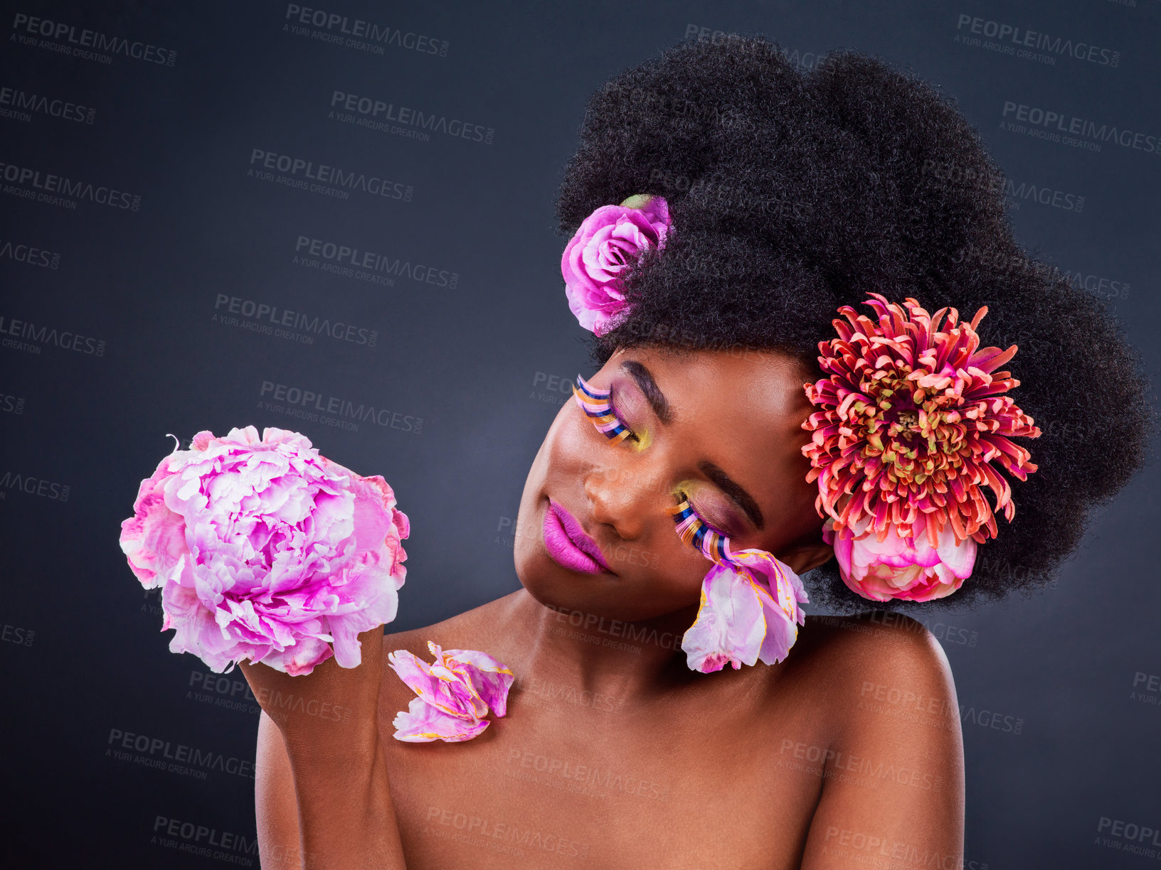Buy stock photo Black woman, flowers and studio with natural makeup in confidence with skincare, gentle and plant. Nature, rose and peonies for health with wellness for beauty in spring with afro for cosmetic