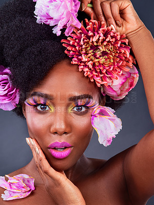 Buy stock photo Beauty, flowers and lashes with portrait of black woman in studio on dark background for natural cosmetics. Face, makeup or makeover and young model with protea in hair for aesthetic wellness at spa