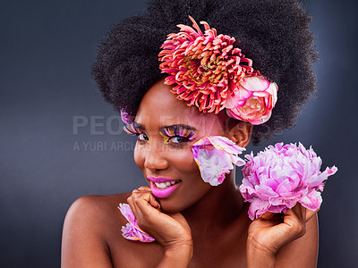Buy stock photo Beauty, flowers and portrait of happy black woman in studio on dark background for natural cosmetics. Face, makeup or smile and young afro model with protea in hair for aesthetic wellness at spa