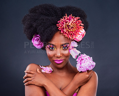 Buy stock photo Flowers, portrait and black woman with makeup in studio for organic beauty on dark background. Floral, face and African lady model smile for eco friendly, natural and cosmetics with isolated mockup 
