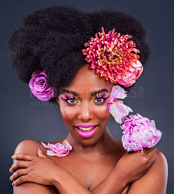 Buy stock photo Makeup, portrait and black woman with flowers in studio for natural cosmetics on dark background. Floral, face and African female model pose with eco friendly, beauty and care on isolated color 