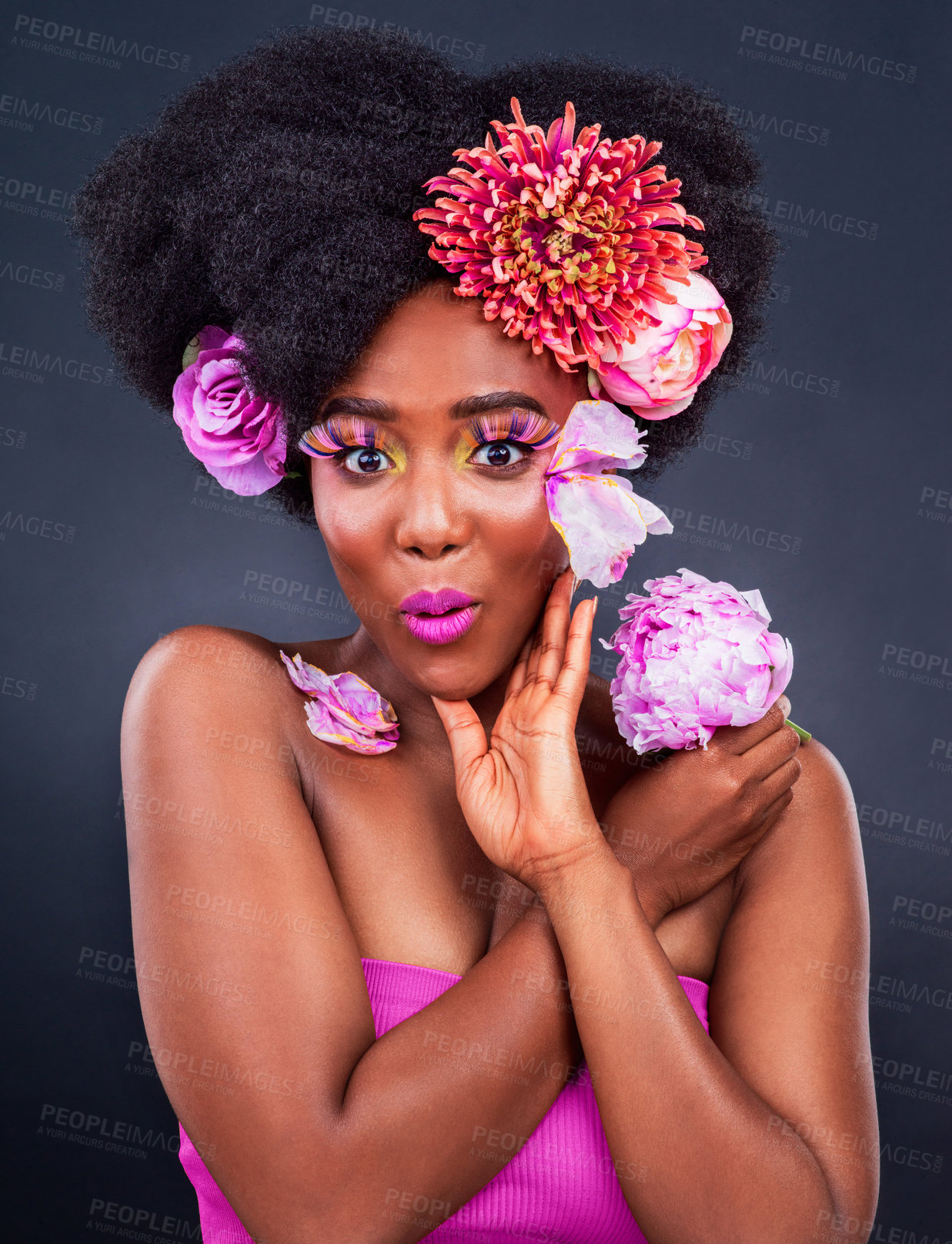 Buy stock photo Beauty, flowers and wow portrait of black woman in studio on dark background for natural cosmetics. Face, makeup or surprise and young afro model with protea in hair for aesthetic wellness at spa