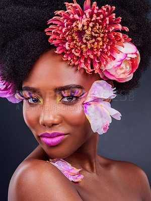 Buy stock photo Makeup, flowers and art with portrait of black woman for beauty, creative and spring. Natural, cosmetics and floral with face of model isolated on studio background for color, self love or confidence