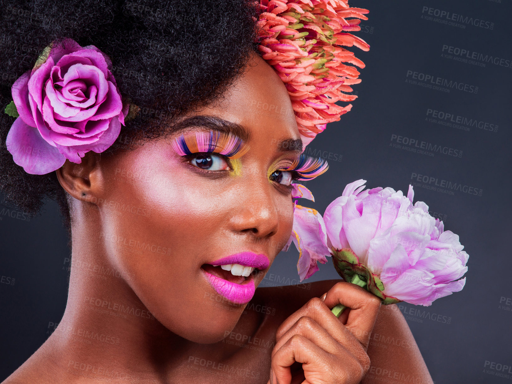 Buy stock photo Beauty, flower and portrait of afro black woman in studio on dark background for natural cosmetics. Face, makeup or perfect skin and young model with protea in hair for aesthetic wellness at spa