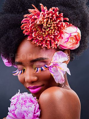 Buy stock photo Black woman, afro or flowers of organic, beauty or hair care of spring, health or wellness in studio. African girl, rose or lash aesthetic as idea, art or happy as natural makeup on grey background