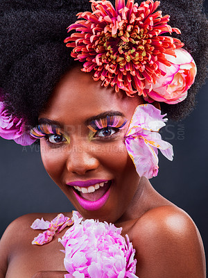 Buy stock photo Beauty, flowers and surprise with portrait of black woman in studio on dark background for natural cosmetics. Afro, face or wow and happy young model with protea in hair for aesthetic wellness at spa