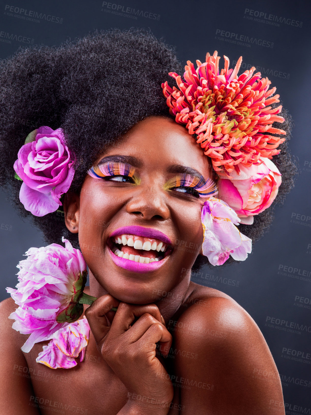 Buy stock photo Black girl, afro or flowers of organic, beauty or hair care of happy spring or wellness in studio. African woman, rose or lash aesthetic as idea, fun or laugh as colorful makeup on grey background