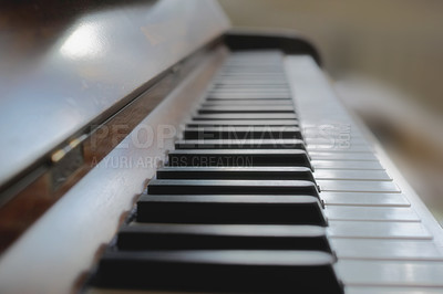 Buy stock photo Closeup of classical wooden piano keys on display at a musical art gallery. An antique and vintage keyboard is used to compose classic jazz music or songs. A part of an old instrument