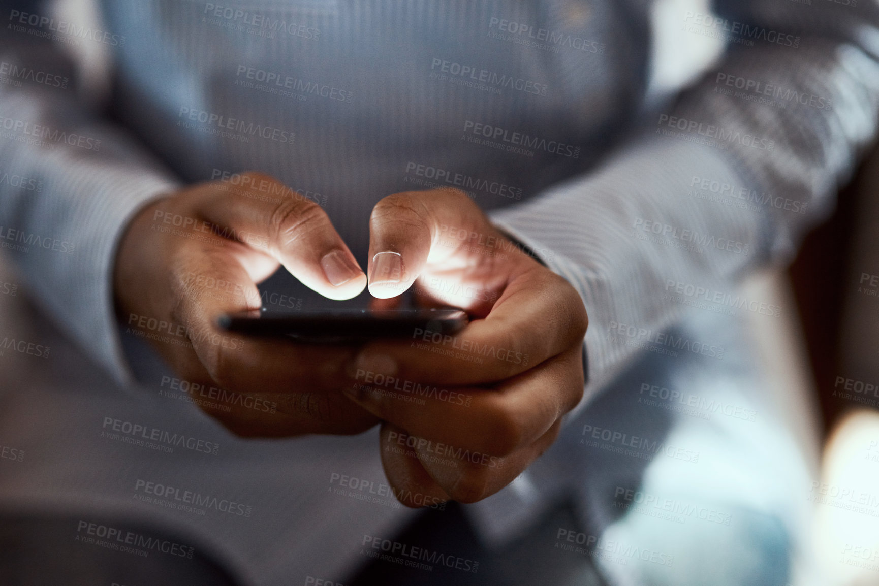 Buy stock photo Cropped sot of an unrecognisable businesswoman using a smartphone