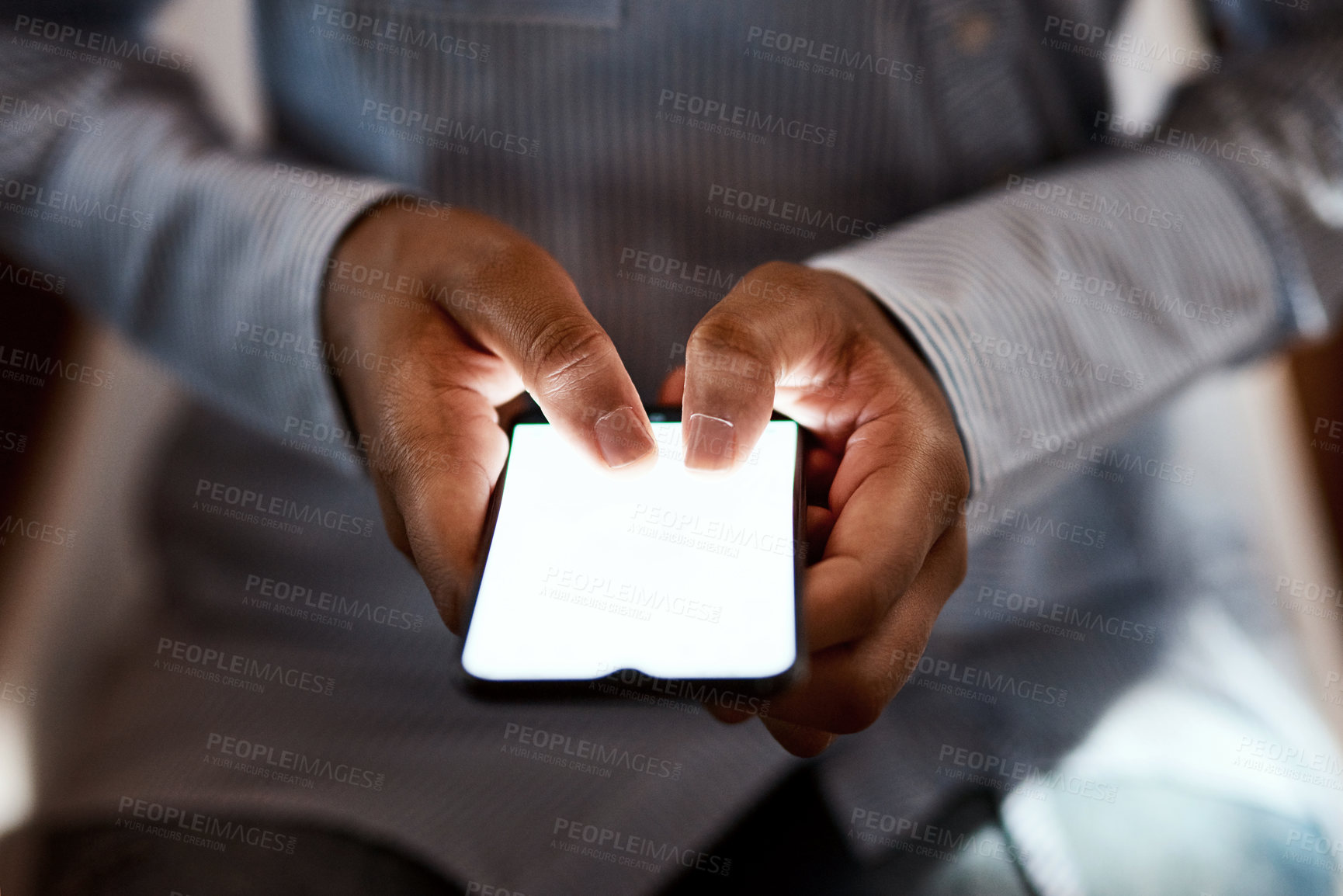 Buy stock photo Cropped sot of an unrecognisable businesswoman using a smartphone