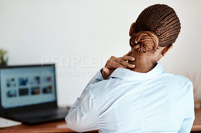 Buy stock photo Cropped shot of a businesswoman experiencing neck pain at work