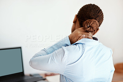 Buy stock photo Cropped shot of a businesswoman experiencing neck pain at work