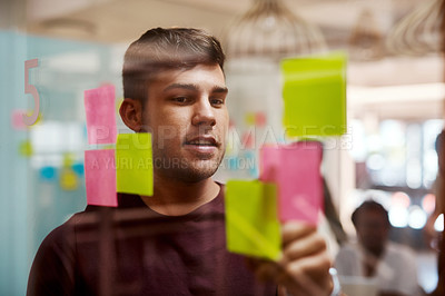 Buy stock photo Brainstorming, creative and idea with man in business meeting for speaker, branding or planning. Collaboration, goal and project management with employee in office for schedule, solution or moodboard