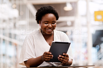 Buy stock photo Reading, business and happy black woman on tablet to check email, app or press release for brand image. Technology, online research or creative worker in startup for pr campaign or social media promo